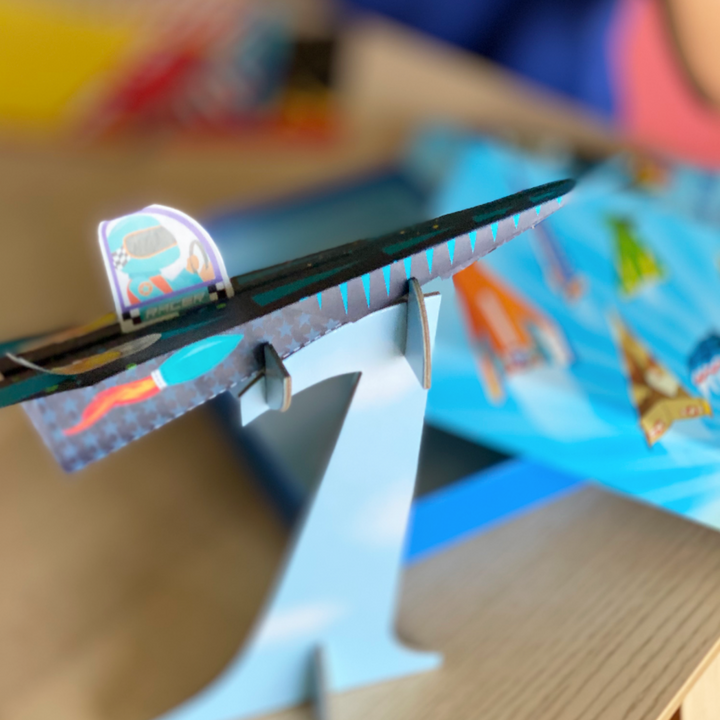 Lifestyle image of a finished paper airplane.