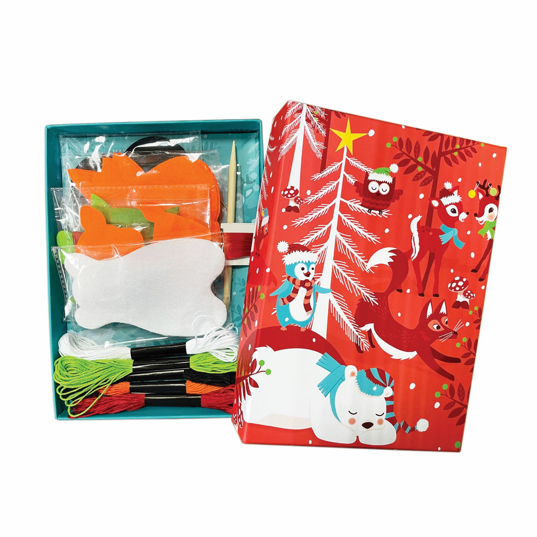 Image of Totally Santa Make Your Own Felt Animal Ornaments box opened to show the nicely packaged materials inside. 