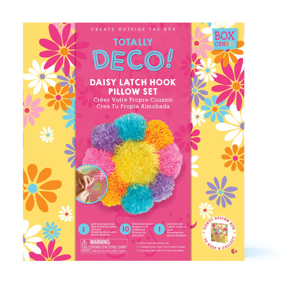 In box image of Totally Deco! Daisy Latch Hook Pillow Set with finished product shown on front
