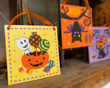 Load image into Gallery viewer, Image of the pumpkin candy, bat, and cat completed halloween diamond art set. 

