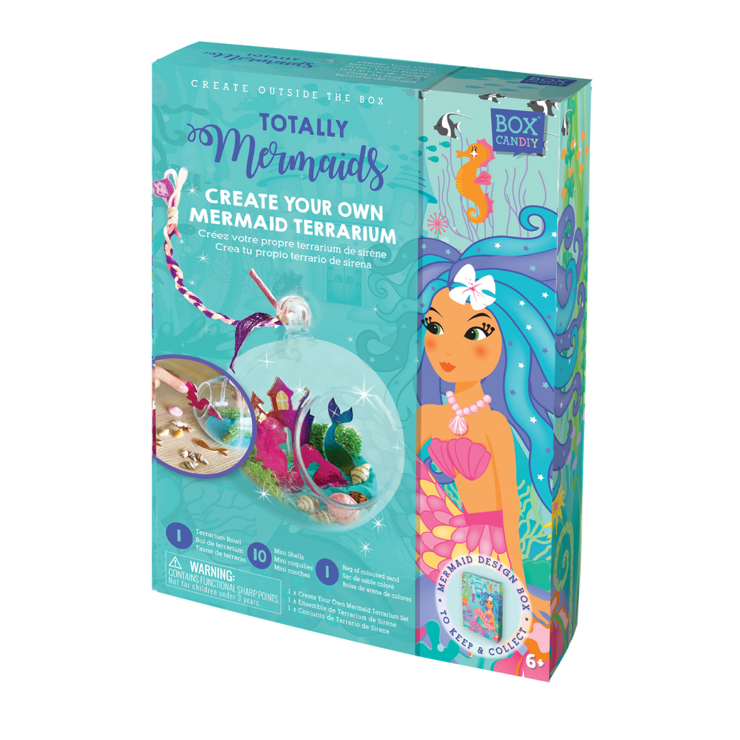 Boxed image of Totally Mermaids Create Your Own Mermaid Terrarium that has a completed terrarium on the front of the box. 