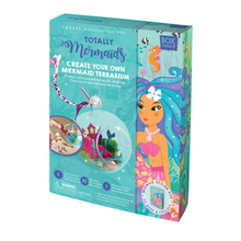 Load image into Gallery viewer, Boxed image of Totally Mermaids Create Your Own Mermaid Terrarium that has a completed terrarium on the front of the box. 
