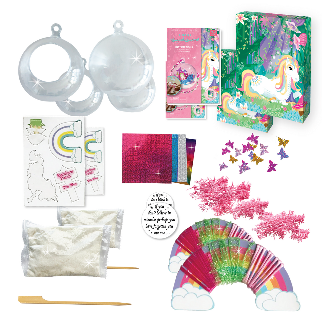 Image of Totally Magical Unicorns Create Your Own Unicorn Terrarium contents which Includes: 1 plastic terrarium bowl, play foam "clouds", 4 cardboard figures with layer of sticky paper, 4 foil sheets, 1 wooden craft stick, pink decorative forest plants, 10 decorative butterflies, stickers, colored lace, colored strings and instructions, all in a beautiful keepsake storage box made from recycled cardboard.