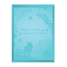 Load image into Gallery viewer, Image of the inside of the Totally Magical Unicorns Create Your Own Unicorn Terrarium cardboard box showing the quote &quot; magic is around you, you just have to believe&quot;.
