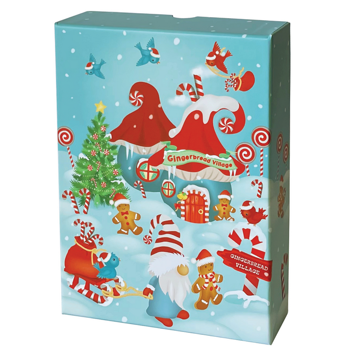 Image of the Totally Santa Make Your Own  Gingerbread Village Ornament cardboard box that has a gingerbread village on it. 