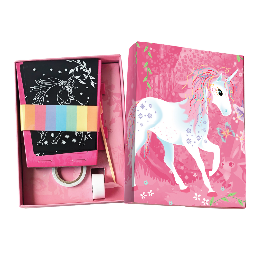 Image of the Totally Twilight Unicorn Lantern Scratch Art Set cardboard box that is opened to show the packaged materials inside. 